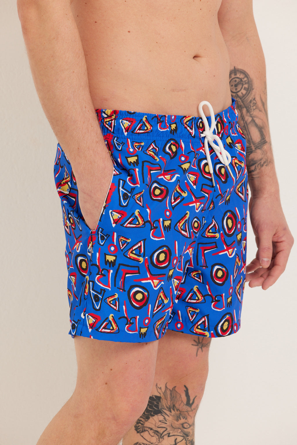 TRIBE SWIM SHORTS