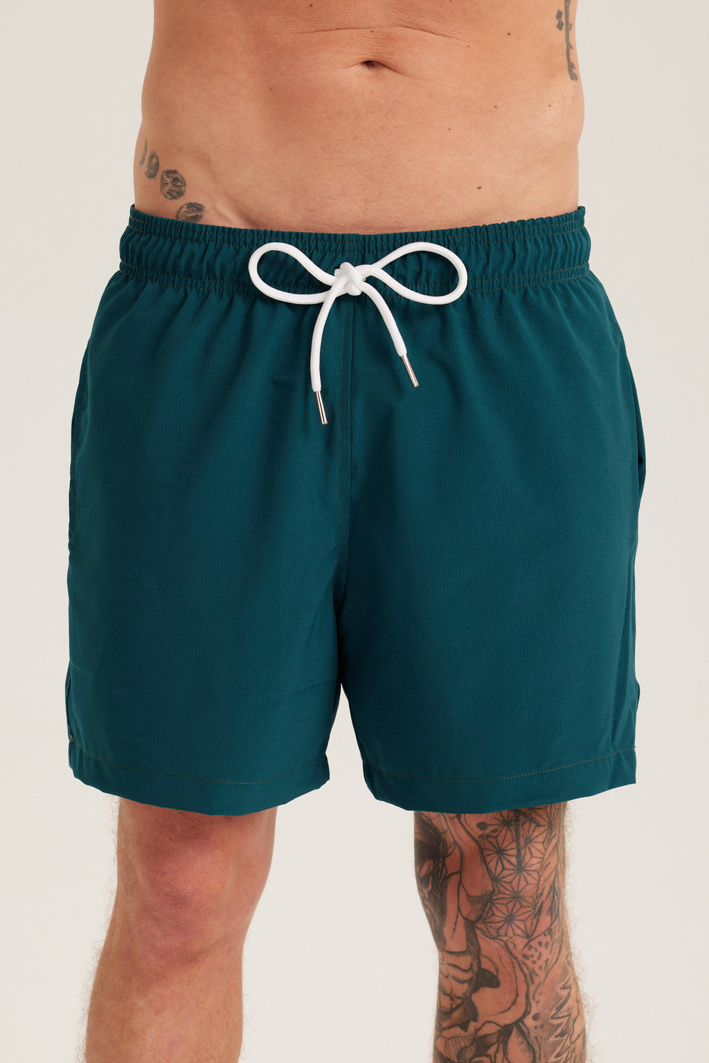 SEAWEED GREEN SWIM SHORTS
