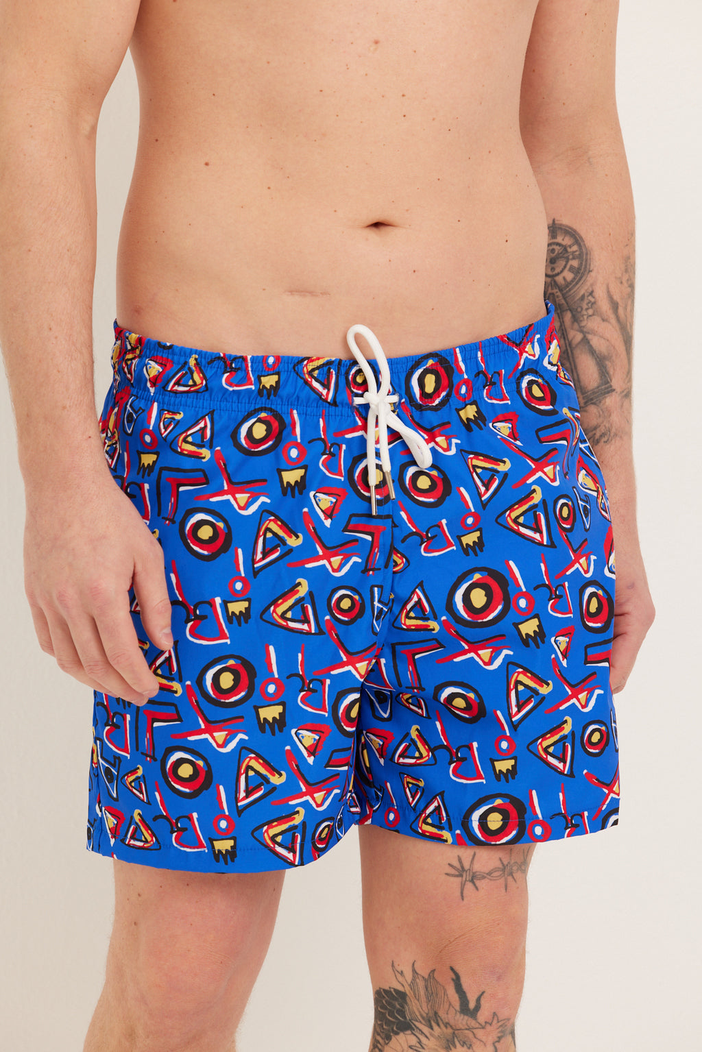TRIBE SWIM SHORTS