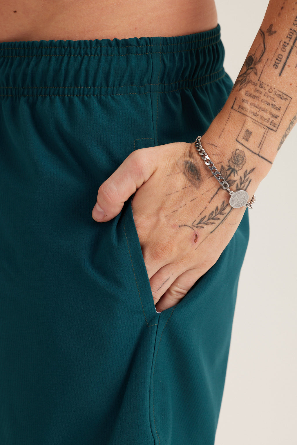 SEAWEED GREEN SWIM SHORTS